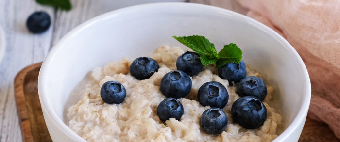 bowl of Oatmeal with blueberries sprinkled on top